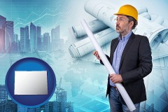 colorado map icon and building contractor holding blueprints - cityscape background