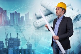 building contractor holding blueprints - cityscape background