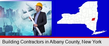 building contractor holding blueprints - cityscape background; Albany County highlighted in red on a map